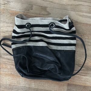 The Sak Black and Cream Striped Backpack with Drawstring Closure